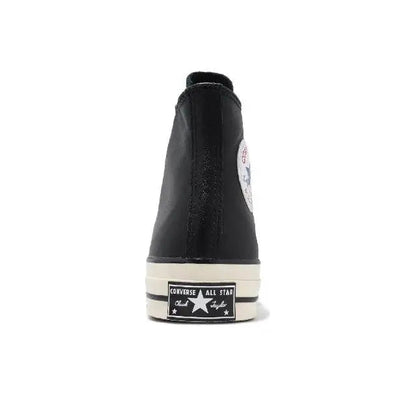 Converse Chuck 70's high-top sneakers, black upper with All Star heel patch and white midsole