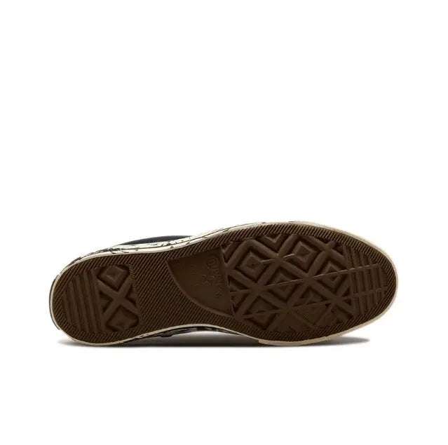 Rubber cupsole outsole with textured tread in dark brown
