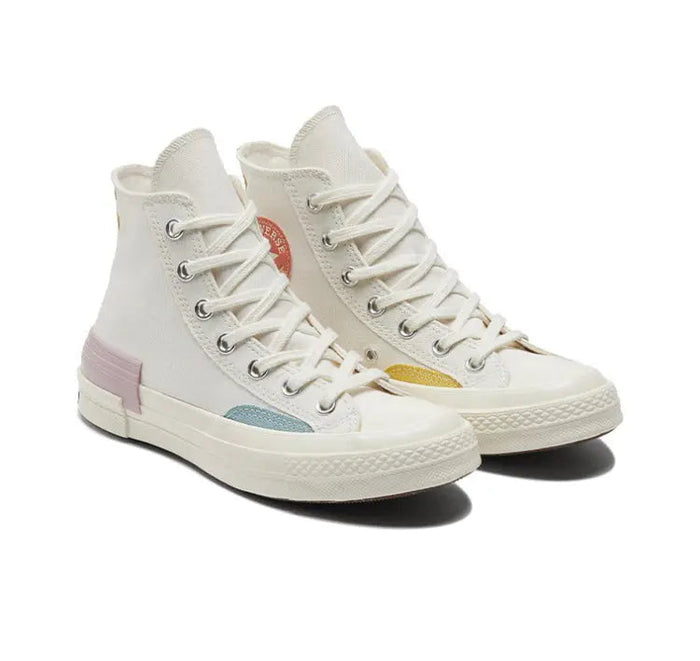 Converse Chuck 70 high-top sneakers, off-white canvas with yellow panel, blue toe, pink sole
