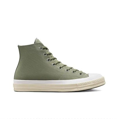 Olive green high-top canvas sneaker with lace-up, rubber toe cap, and white sole