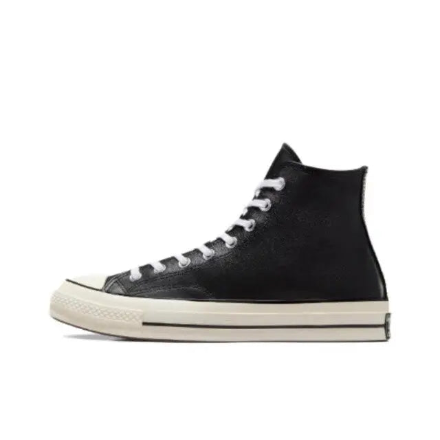 Converse Chuck 70's high-top sneakers, black upper with white midsole and side eyelets