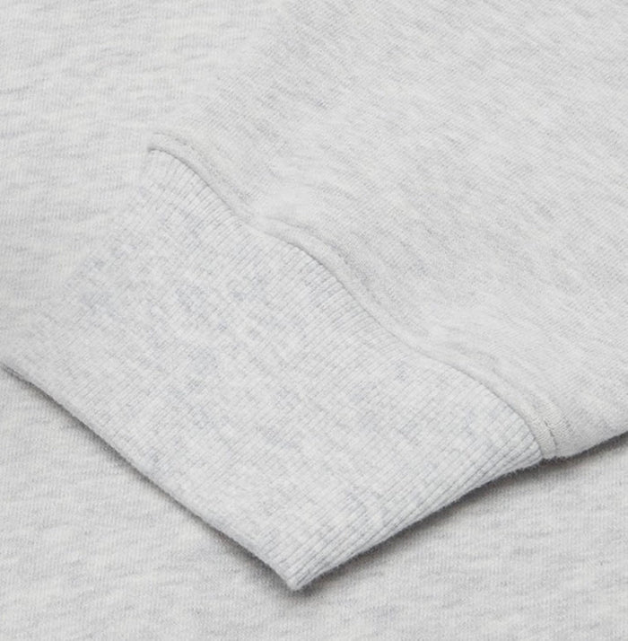 Light gray ribbed cuff and hem on sweatshirt sleeve