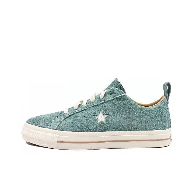 Light blue suede low-top sneaker with star logo, white laces and rubber sole