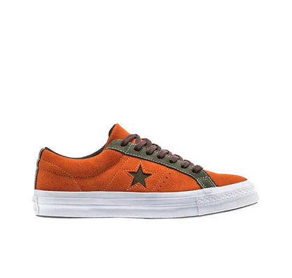 Orange Converse One Star Pro sneakers with black laces, star logo, white sole