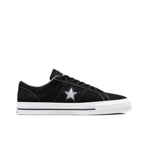 Black One Star Pro low-top sneaker with star logo and white rubber sole