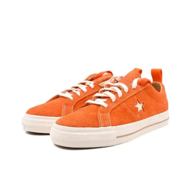 Converse orange low-top sneakers, lace-up with white eyelets and star logo