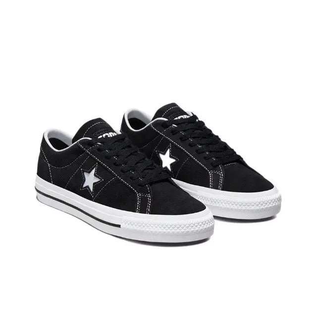 Black One Star Pro low-top sneakers with lace-up front, star emblems, white soles