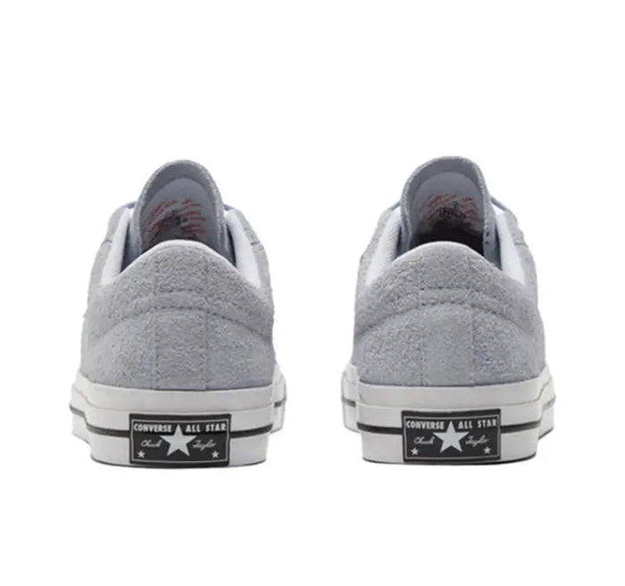 Light grey low-top sneakers rear view with heel All Star patch