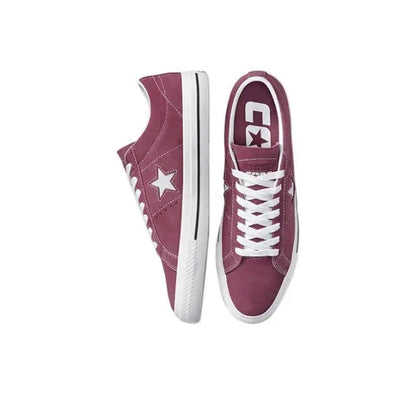 Burgundy low-top sneakers with white star on side and white lace trim