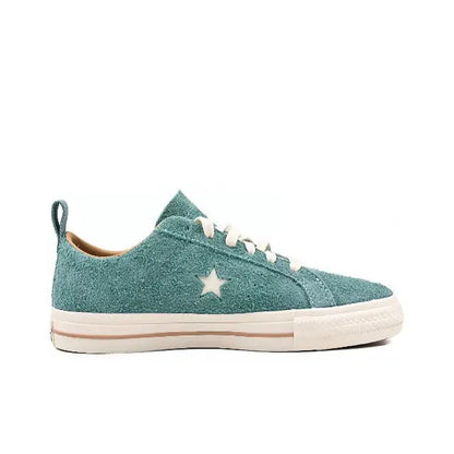 Light blue suede low-top sneaker with side star, white sole and lace-up front
