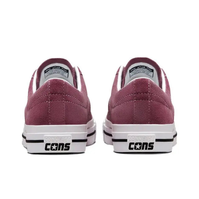 Burgundy low-top sneakers with Converse star heel patch and black lettering