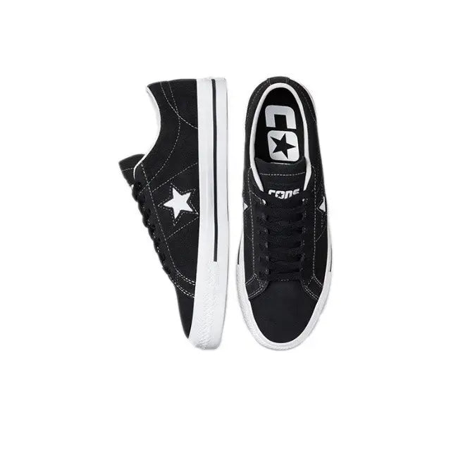 Black One Star Pro sneaker pair with side stripes, star patch, and white midsole