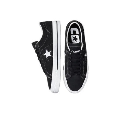 Black One Star Pro sneaker pair with side stripes, star patch, and white midsole