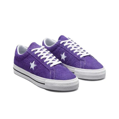 Purple low-top sneakers with white laces, white star details, and gray cupsole
