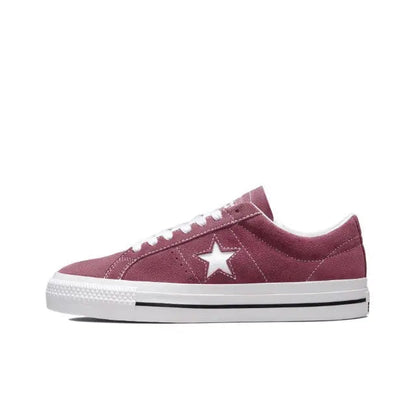Burgundy low-top sneaker with white star logo, white laces, and striped midsole