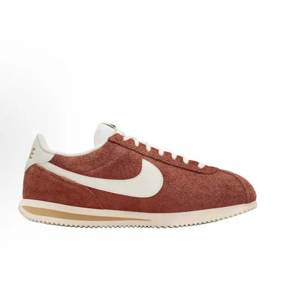 Cortez SE side profile sneaker, dark russet suede with white Swoosh and laces