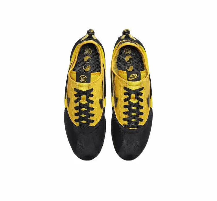Cortez x Clot sneakers pair, black uppers with yellow tongue and laces