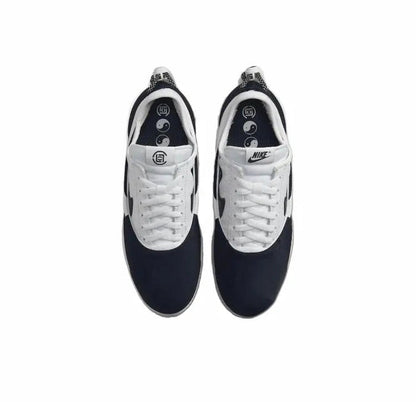 Nike Cortez x Clot sneakers, pair view with white laces and dark navy toe