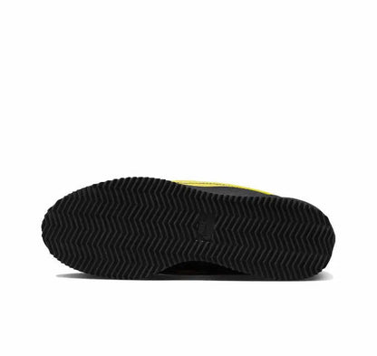 Low-top sneakers outsole, black tread with yellow sidewall edge