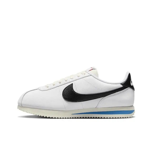 Nike Cortez low-top sneakers, white leather with black Swoosh and blue sole