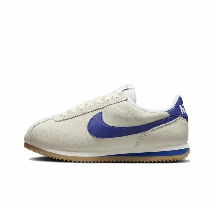 Cortez sneaker in off-white leather with blue swoosh and gum outsole