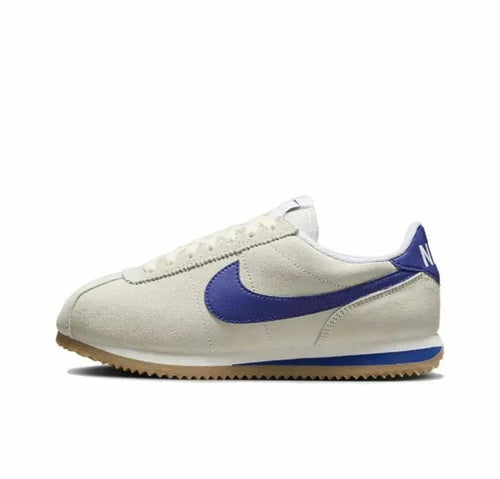 Cortez sneaker in off-white leather with blue swoosh and gum outsole