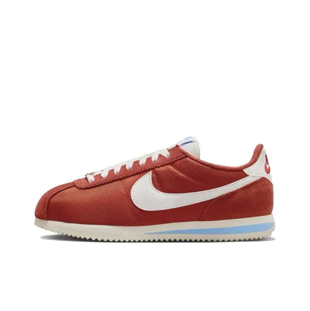 Nike Cortez sneakers: red suede, white Swoosh, blue stripe sole