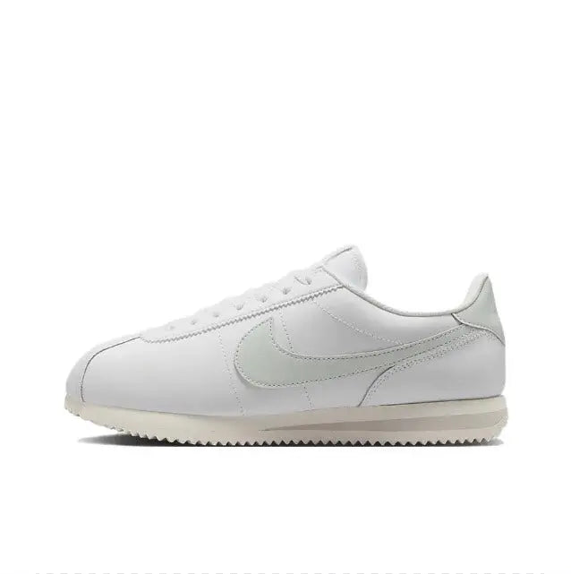 White low-top sneaker with Nike Swoosh and lace-up front