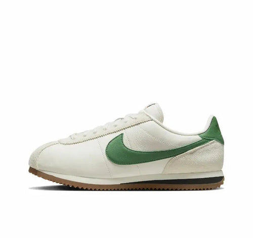Nike Cortez low-top sneakers, white leather with green swoosh and gum sole