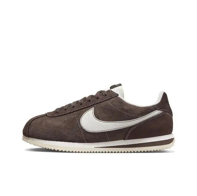 Nike Cortez low-top sneakers in dark brown with white Swoosh and lace-up