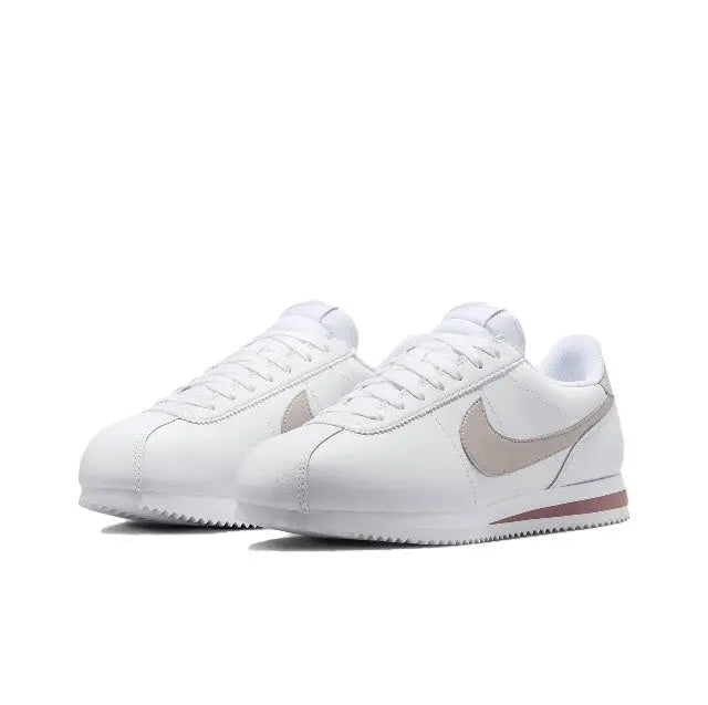 Low-top sneakers, white leather with beige swoosh and red-brown heel stripe