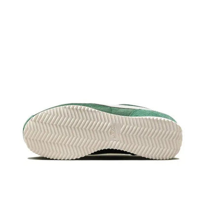 Nike Cortez sneaker outsole with white zigzag tread and dark heel detail.
