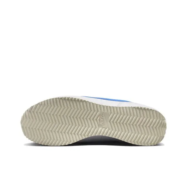 Nike Cortez sneakers outsole with zigzag tread, white and light blue accents