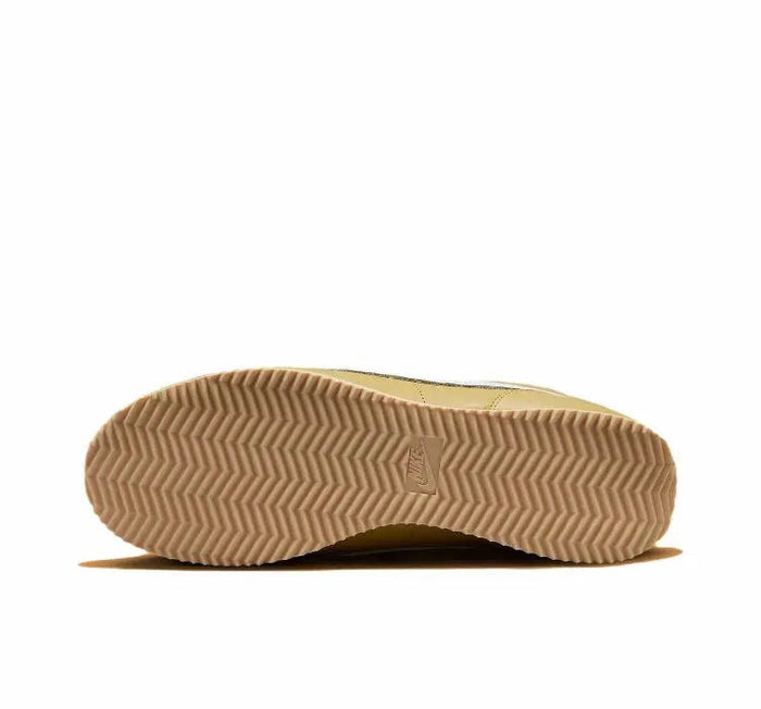 Cortez sneakers outsole, textured zigzag tread with light tan rubber and center logo