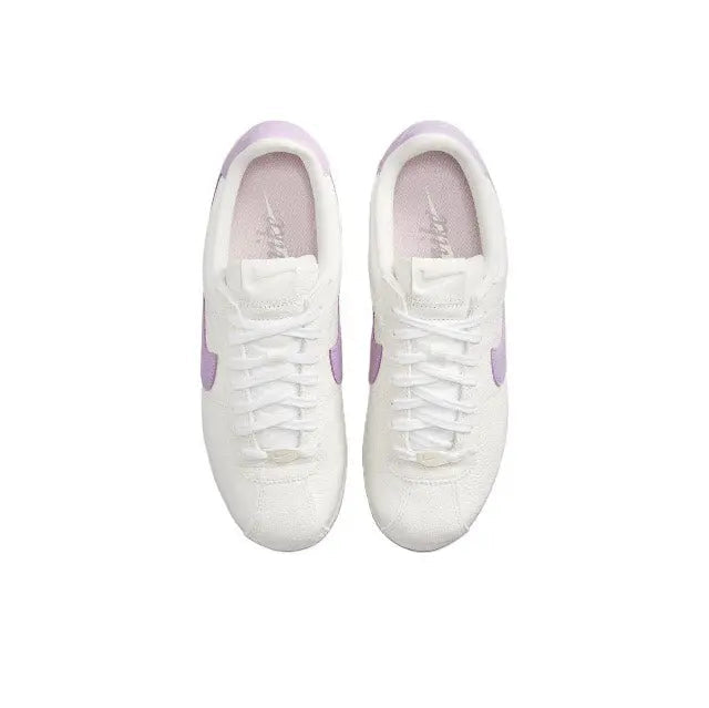 Cortez sneakers pair view, white laces with lilac heel accents