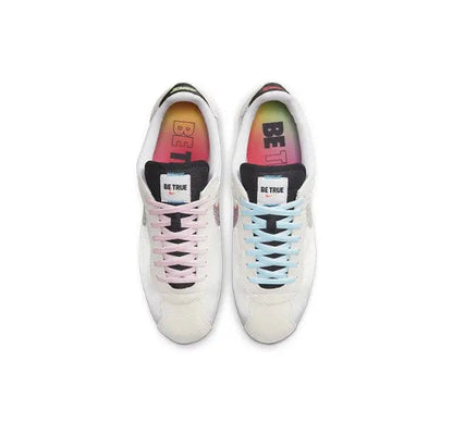 Nike Cortez sneakers, white uppers with pink laces and “BE TRUE” tongue logos