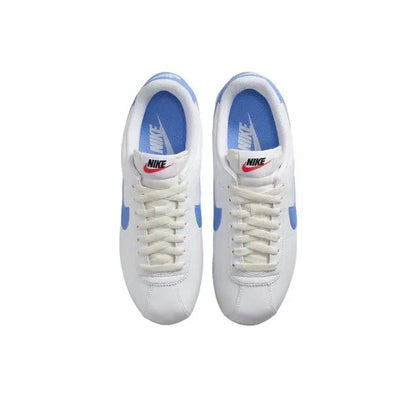 Nike Cortez sneakers top view pair, white with blue lining and swoosh