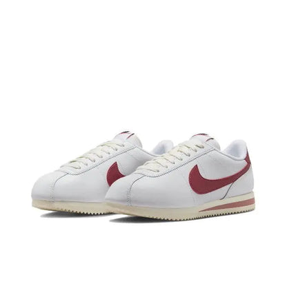 Nike Cortez sneakers, white leather with burgundy swoosh and tan sole stripe