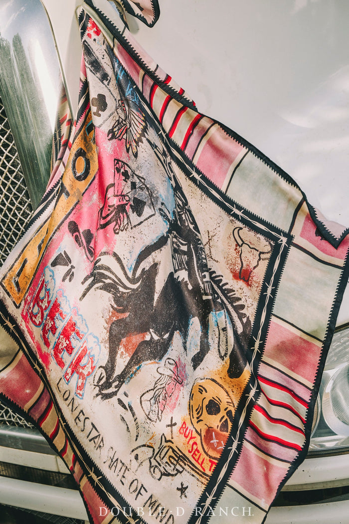 Silk scarf draped over shoulder, cowboy graffiti artwork with pink and striped edges