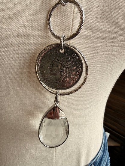 Round coin charm pendant with teardrop crystal drop and linked silver chain