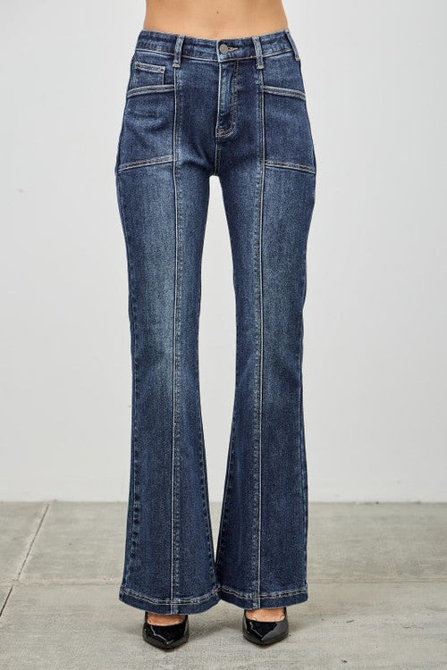 Dark wash bootcut jeans front view with zipper fly and belt loops