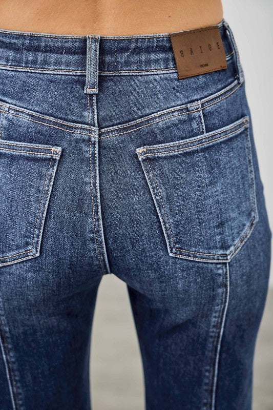 Dark wash bootcut jeans with seam detailing and front patch pockets