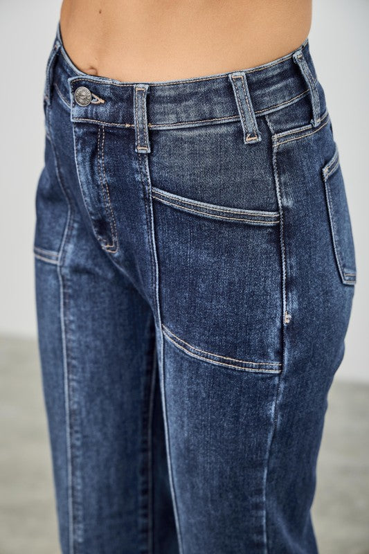 Dark wash bootcut jeans with front patch pockets and contrast seam stitching