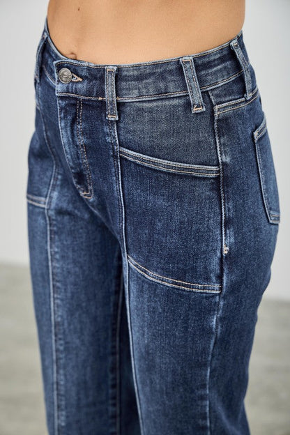 Dark wash bootcut jeans with front patch pockets and contrast seam stitching