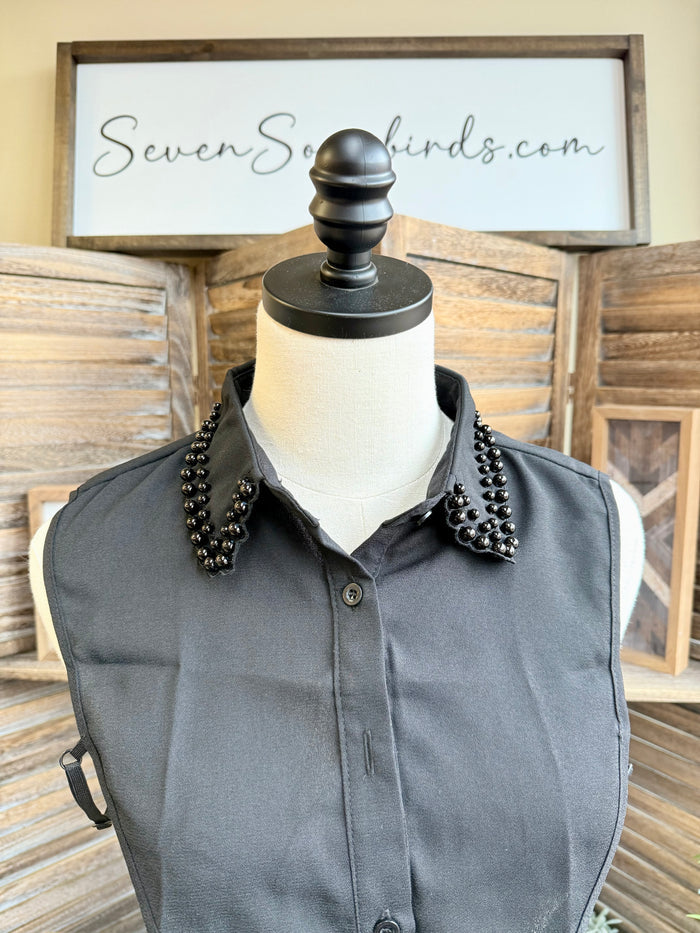 Charcoal faux shirt collar with dark studded trim and gold button front