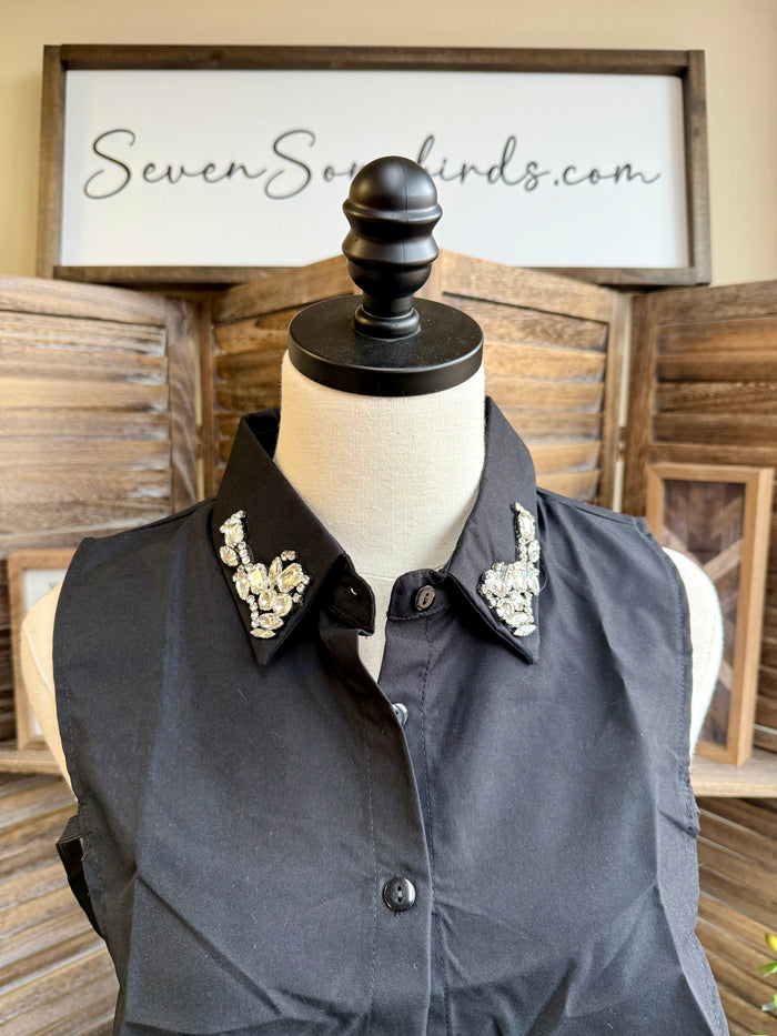 Dark faux shirt collar with jeweled leaf embellishments at the tips and buttons