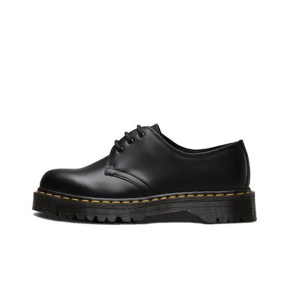 Dr. Martens Bex lace-up shoe in black smooth leather with yellow stitching and platform sole