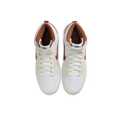 Nike Dunk High high-top sneakers, white uppers with red accents; visible tongue and laces