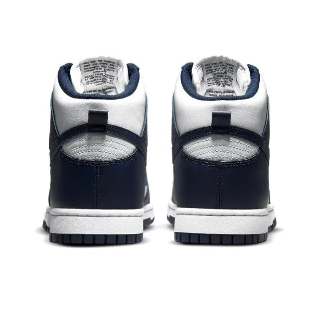 High-top sneakers heel view, dark navy leather with white trim and padded collar