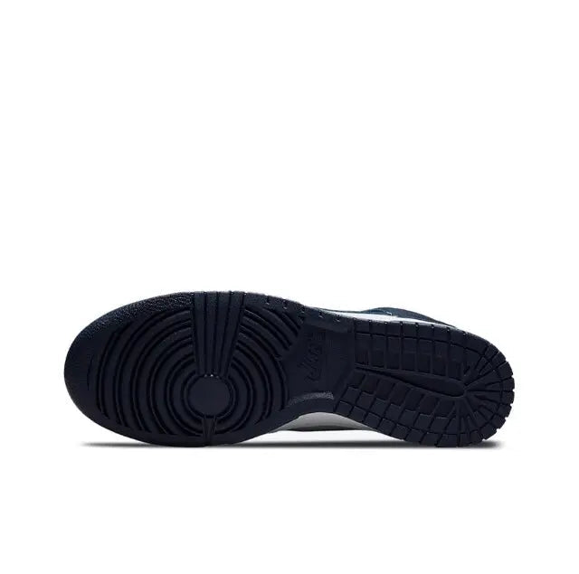 High-top sneakers outsole, dark rubber tread with circular pivot pattern